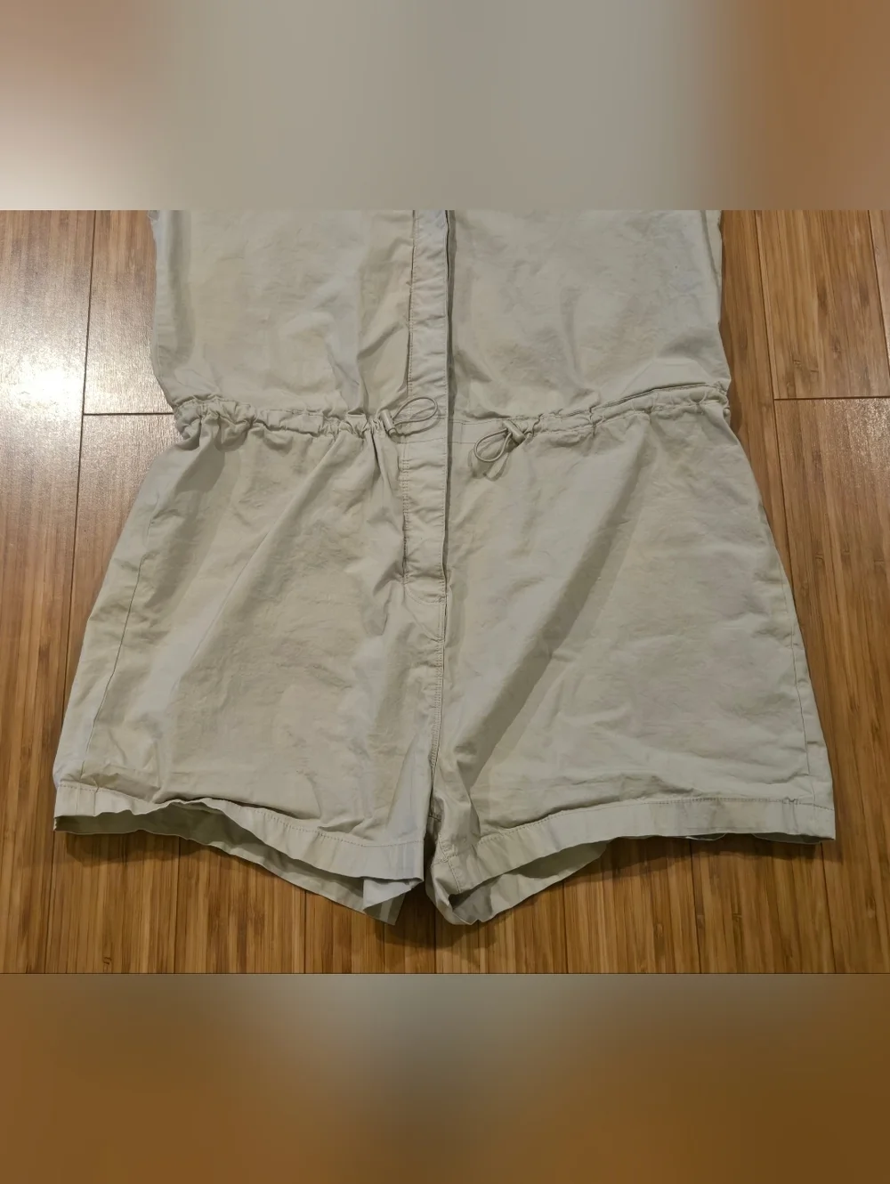 Celeberity Pink Sleeveless Drawstring Romper in Light Beige